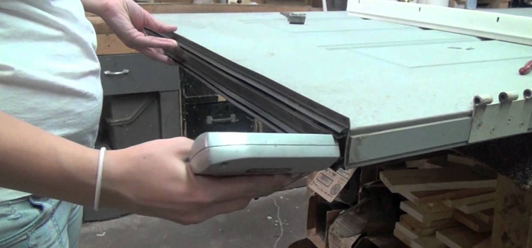 damaged steel door repair Tamarac